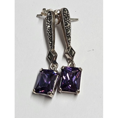 238 - A pair of Silver and Amethyst Earrings.