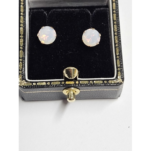 239 - A pair of 9ct Gold and Opel Earrings.