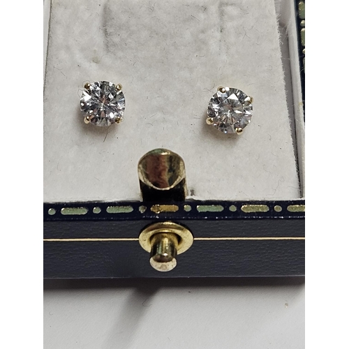 241 - A pair of 9ct Gold stud Earrings.