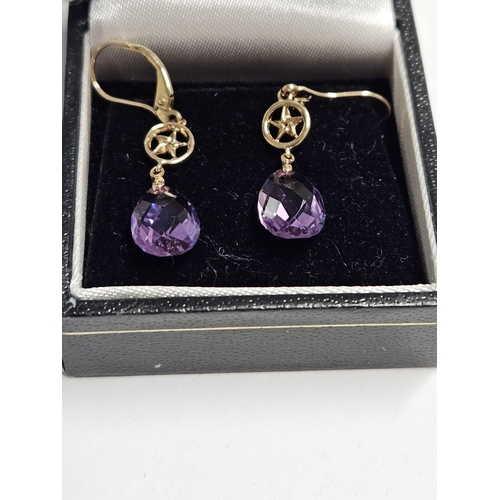 247 - A pair of 9ct Gold and Amethyst Earrings.