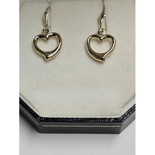 258 - A pair of 9ct Gold Earrings.