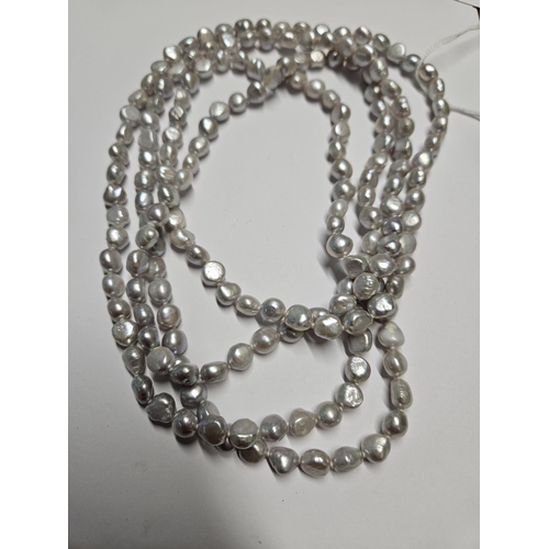 260 - A Muff length of cultured Pearls, approx length 160 cm.