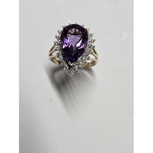 262 - A 9ct Gold, Diamond and Amethyst cluster Ring, size  J1/2.