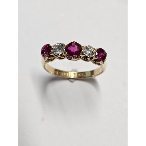 264 - An 18ct Gold, Diamond and Ruby Ring, size L1/2.