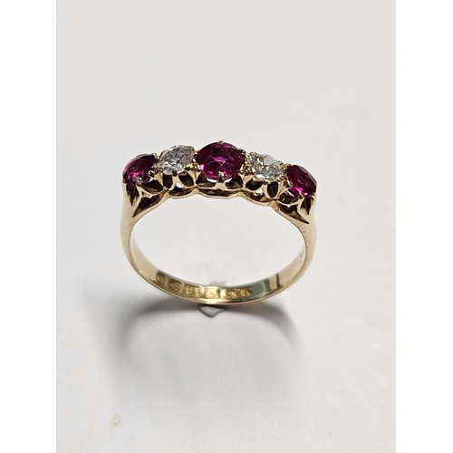 264 - An 18ct Gold, Diamond and Ruby Ring, size L1/2.