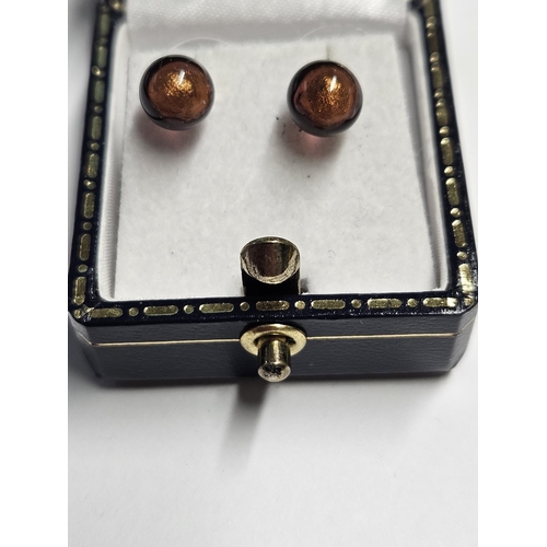 266 - A pair of Cultured Pearl Earring in a Chocolate colour