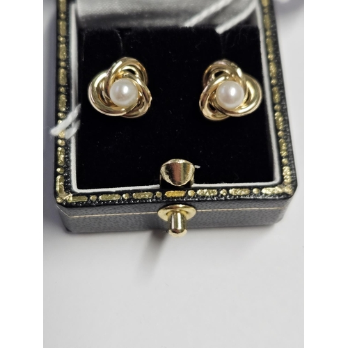 274 - A pair of 9ct Gold and Pearl Earrings.