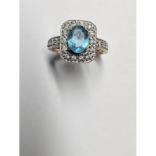 281 - An 14ct Gold, Diamond and Topaz cluster Ring, size K1/2.