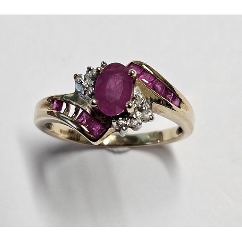 282 - A 9ct Gold, Diamond and Ruby cluster Ring, size N.