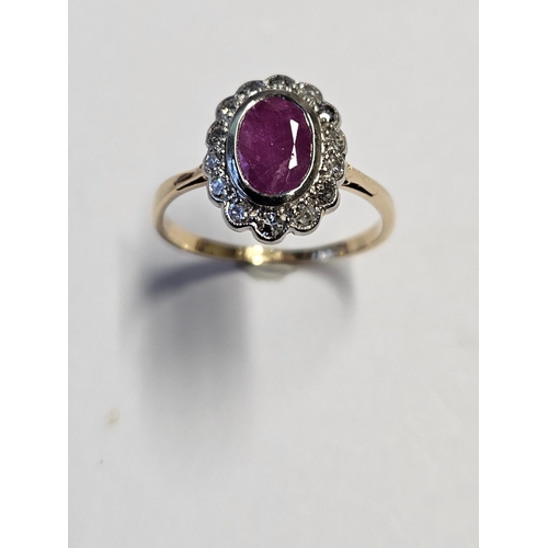 288 - An 18ct Gold Victorian, Diamond and Ruby cluster Ring, size K.