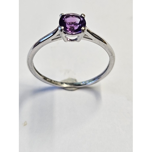 289 - A 9ct Gold and Amethyst set Ring, size S.