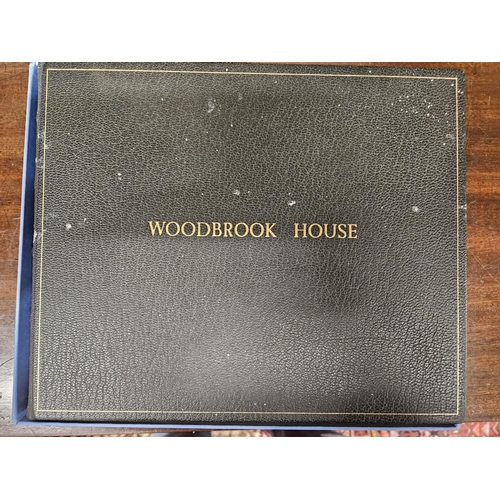 102 - A leather bound Guest Book for Woodbrook House. W 23 x H 22 cm approx.