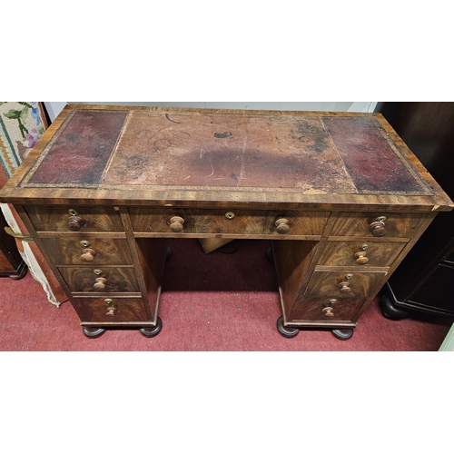 150 - A really good early Regency Mahogany kneehole Desk of very small proportions on turned supports and ... 