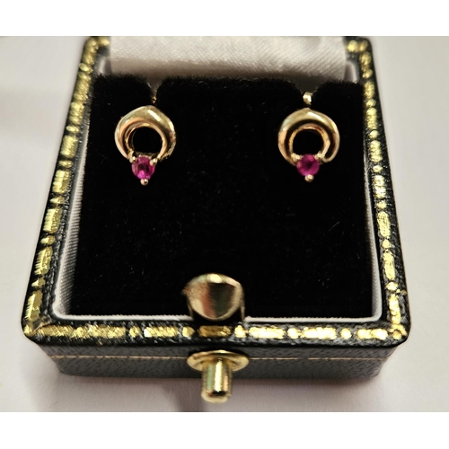 310 - A pair of Gold and Ruby set Earrings.