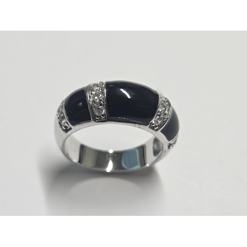 336 - A Silver and Onyx Ring, size N.