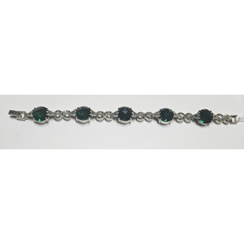 346 - A large Silver and green stone Bracelet in the Art Deco style.