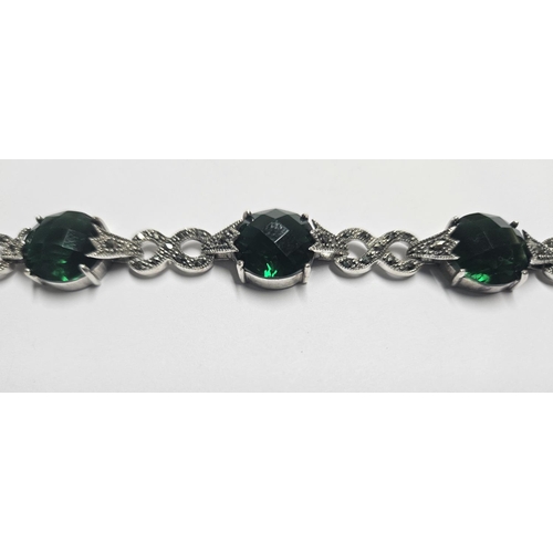 346 - A large Silver and green stone Bracelet in the Art Deco style.