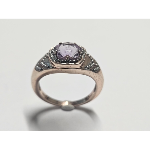 348 - A nice Silver and Amethyst Ring, size N1/2.