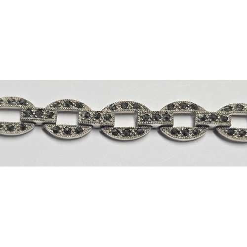 357 - A Silver and Marcasite Bracelet.