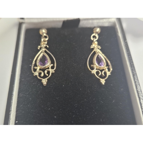 358 - A lovely pair of 9ct Gold and Amethyst Earrings.