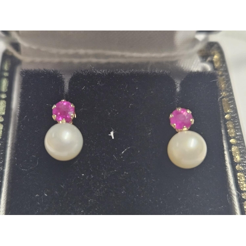 360 - A 9ct Gold, cultured Pearl and Ruby Earrings.