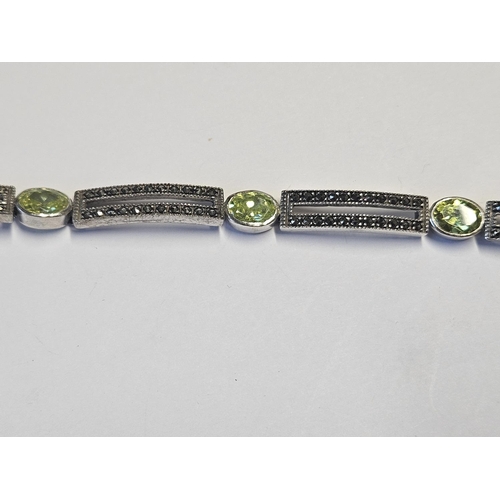 389 - A lovely Silver, Peridot and Marcasite Bracelet.