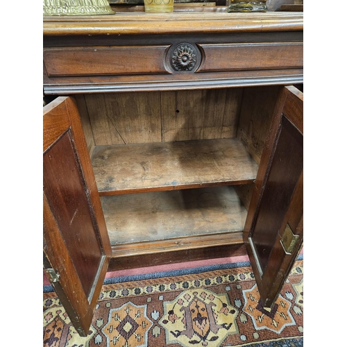 567 - An unusual 19th Century Mahogany twin door Side Cabinet of narrow proportions with single drawer fri... 