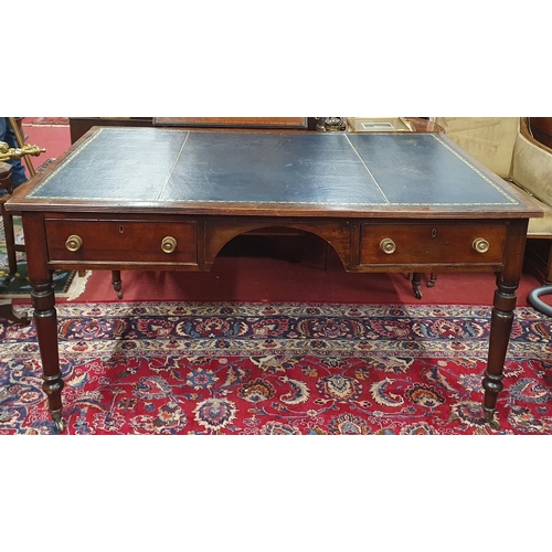 615 - A really good Regency Mahogany and veneered Writing Table on turned supports with tooled leather top... 