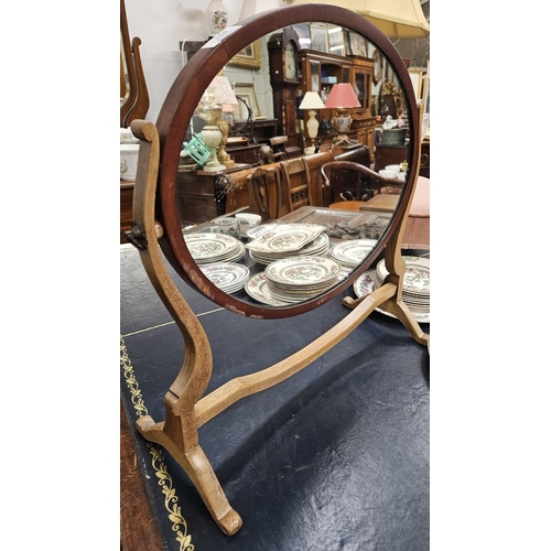 621 - An Edwardian Mahogany oval Crutch Mirror. W 50 x H 50 cm approx.