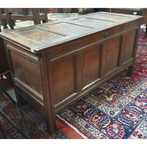 625 - An 18th Century Oak Mule Chest with quadruple panel front on square supports. H 73 x W 137 x D 57 cm... 