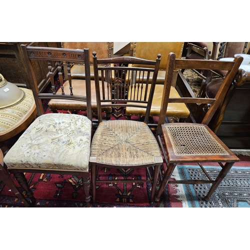 632 - A group of three late 19th early 20th Century Chairs.