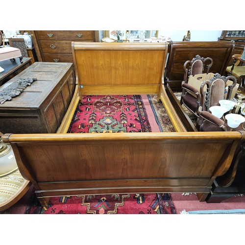 638 - A good Cherrywood double Sleigh bed.
L 210 x W 148 cm approx.