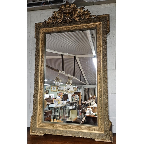 733 - A really good 19th Century Timber Plaster Gilt Pier Mirror with urn shape cartouche top and highly m... 