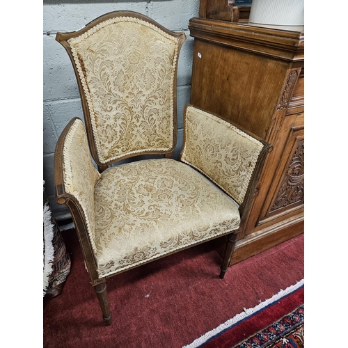 749 - An Edwardian Mahogany and Inlaid Chair of unusual form on turned inlaid supports. W 57 x SH 43 x BH ... 