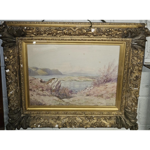 760 - Thomas Hill McKay. 1875-1941. A Watercolour of a Scottish lake scene in a highly ornate timber and p... 