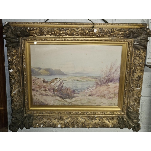 760 - Thomas Hill McKay. 1875-1941. A Watercolour of a Scottish lake scene in a highly ornate timber and p... 