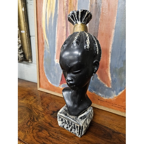 763 - A Plaster Bust of an African Lady.