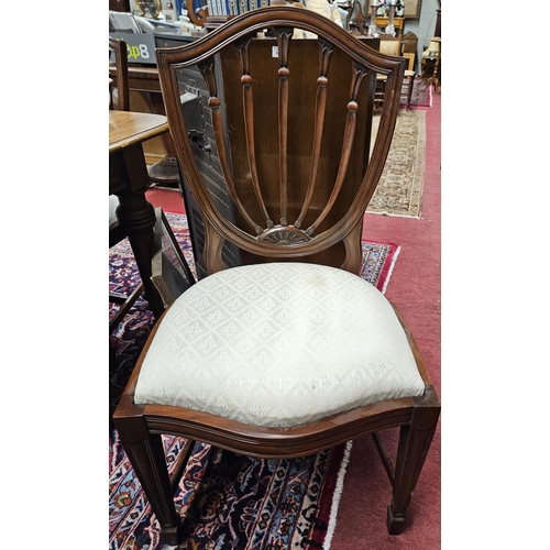 802 - A good set of ten Hepplewhite style Mahogany Chairs with ribbed backs on square tapered supports and... 