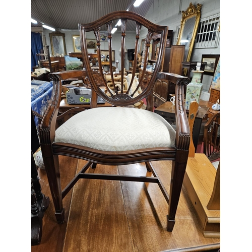 802 - A good set of ten Hepplewhite style Mahogany Chairs with ribbed backs on square tapered supports and... 