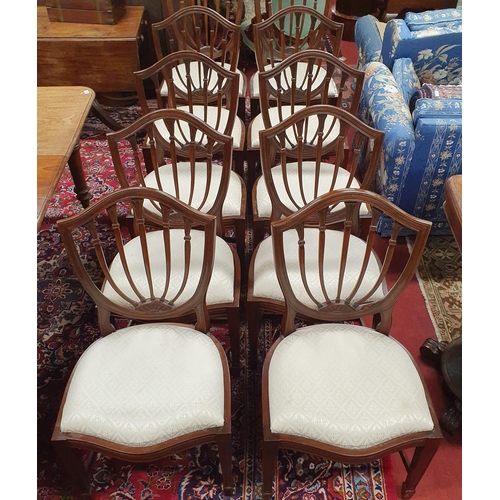 802 - A good set of ten Hepplewhite style Mahogany Chairs with ribbed backs on square tapered supports and... 