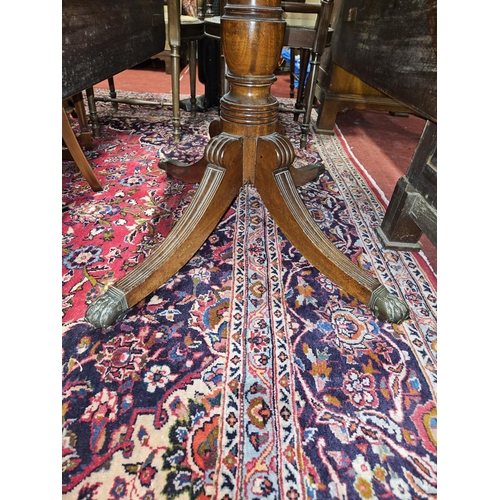 812 - A good Regency Mahogany Pembroke Table with single frieze drawer and brass claw castors. 94 x 116 x ... 