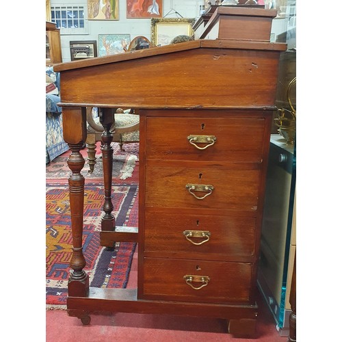 858 - Of good quality. A late 19th Century Walnut Davenport with four real and four dummy drawers on turne... 