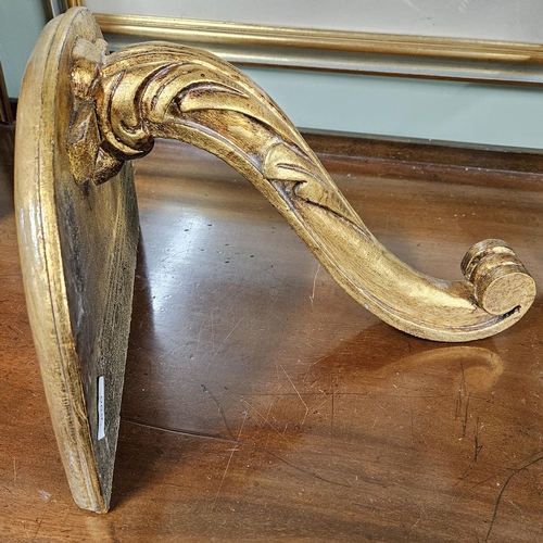 890 - A good Gilt single arm Wall Bracket.