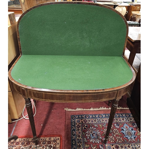 940 - A good Regency Mahogany and Inlaid foldover Card Table on turned reeded supports in the Gillows styl... 