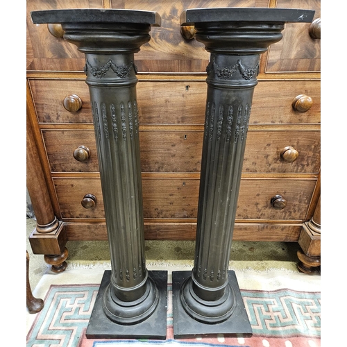 983 - A good pair of Bronze effect Pedestals with carved fluted shafts. Base 29 x 29 x H 104 cm approx.