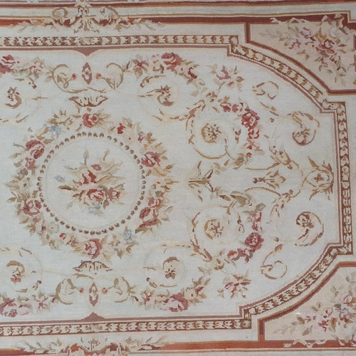 995A - An Aubusson design Wall Hanging with cream ground and repeating floral decoration. 178 x 114 cm appr... 