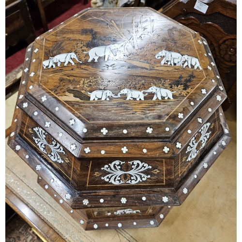 1065 - An unusual Hardwood table Cabinet with fitted velvet interior depicting elephants on the move. W 50 ... 