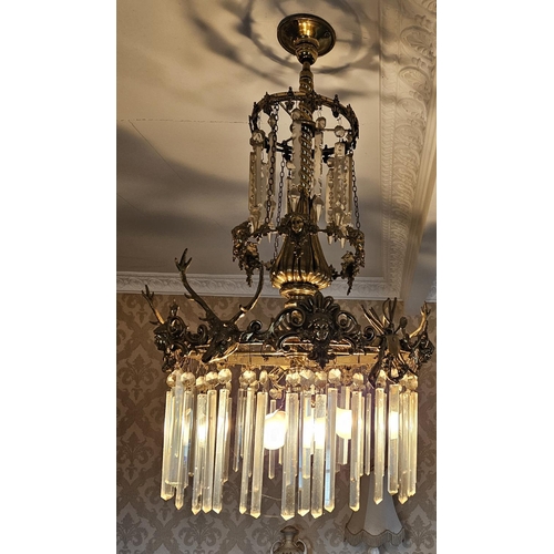 67 - A Superb 19th Century Brass and Waterford Crystal  Chandelier of circular form with highly moulded o... 