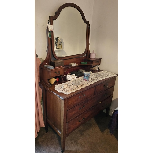 91 - A late 19th Century Mahogany dressing Chest with mirrored back.