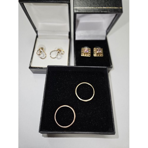 300 - Two pairs of 9ct Gold Earrings along with two 9ct Gold Rings. Total weight 6grms.